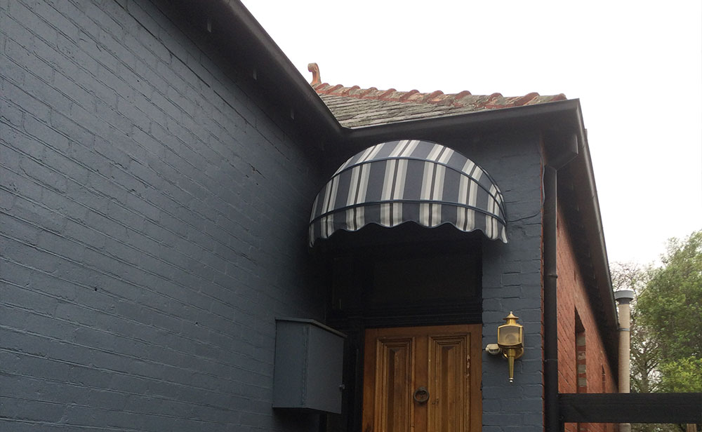 gray-bow-awning image of gray bow awning