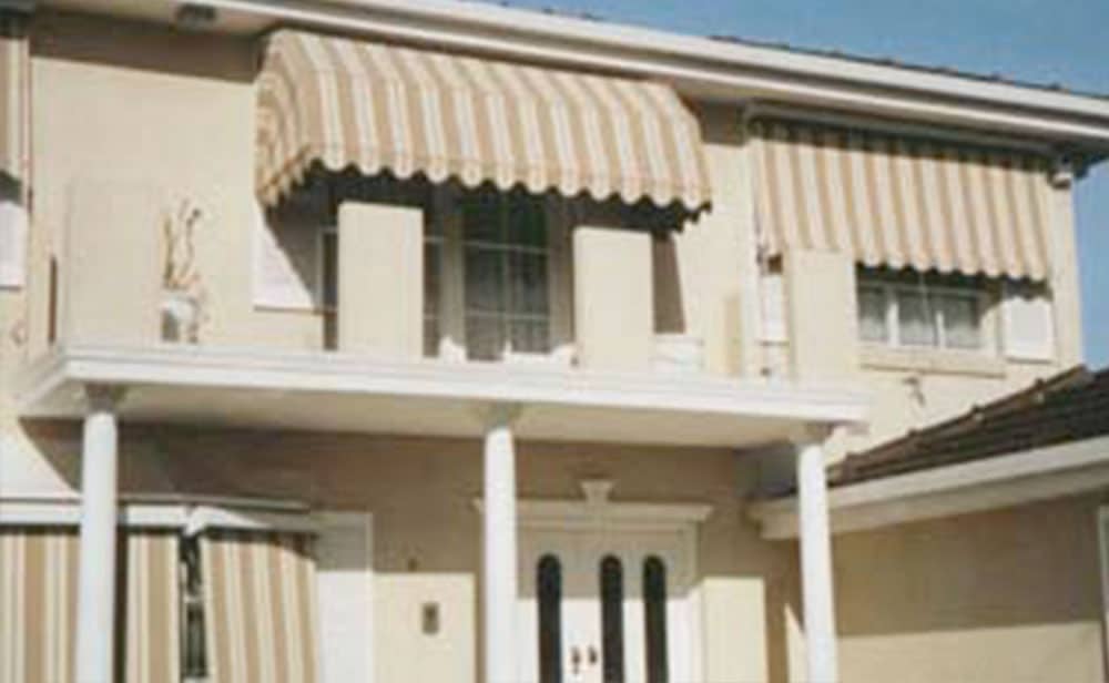 cream-Dutch-Hood-Awnings image of cream-Dutch-Hood-Awnings